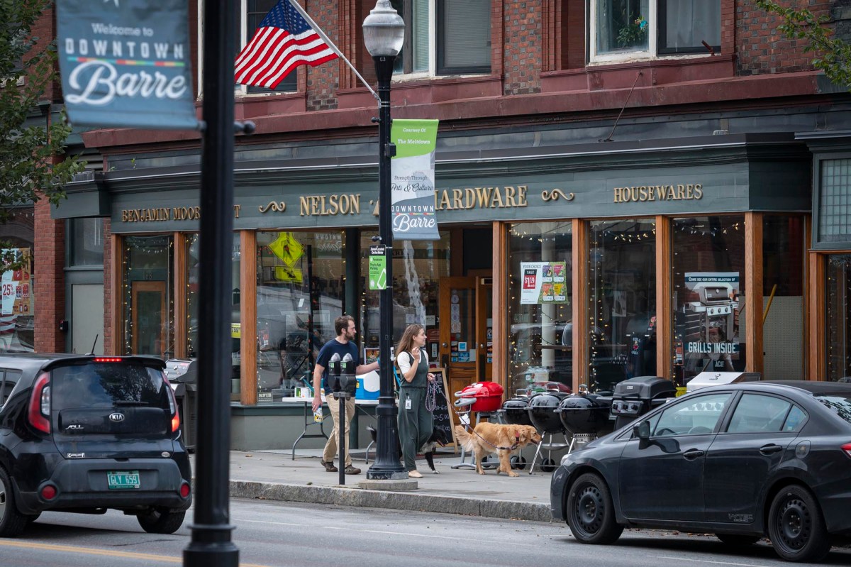 A car driving down a street.