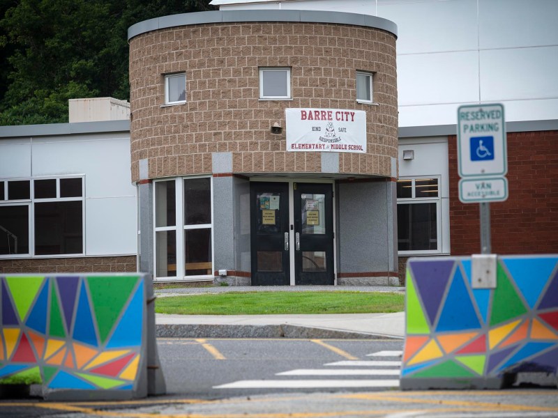 A colorful mural painted on the side of a building.