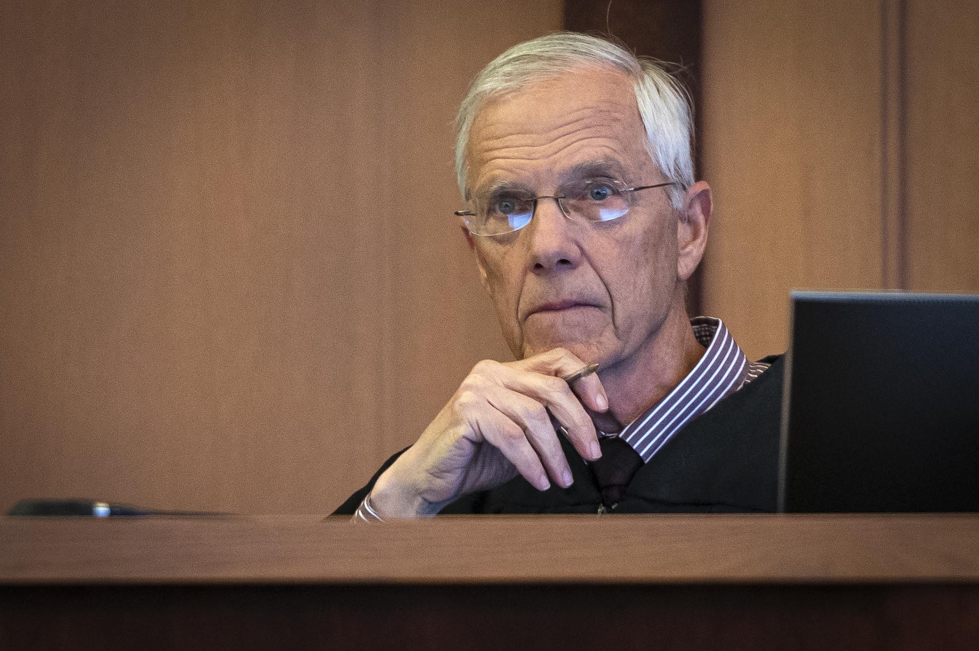 Daniel Banyai, appearing from jail with black eye, will remain behind