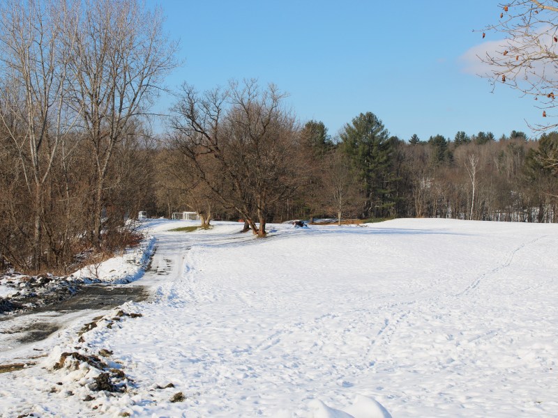 The ground is covered in snow.