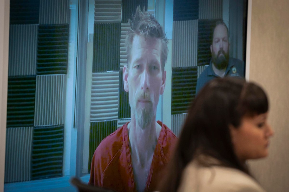 A person being virtually arraigned in court.