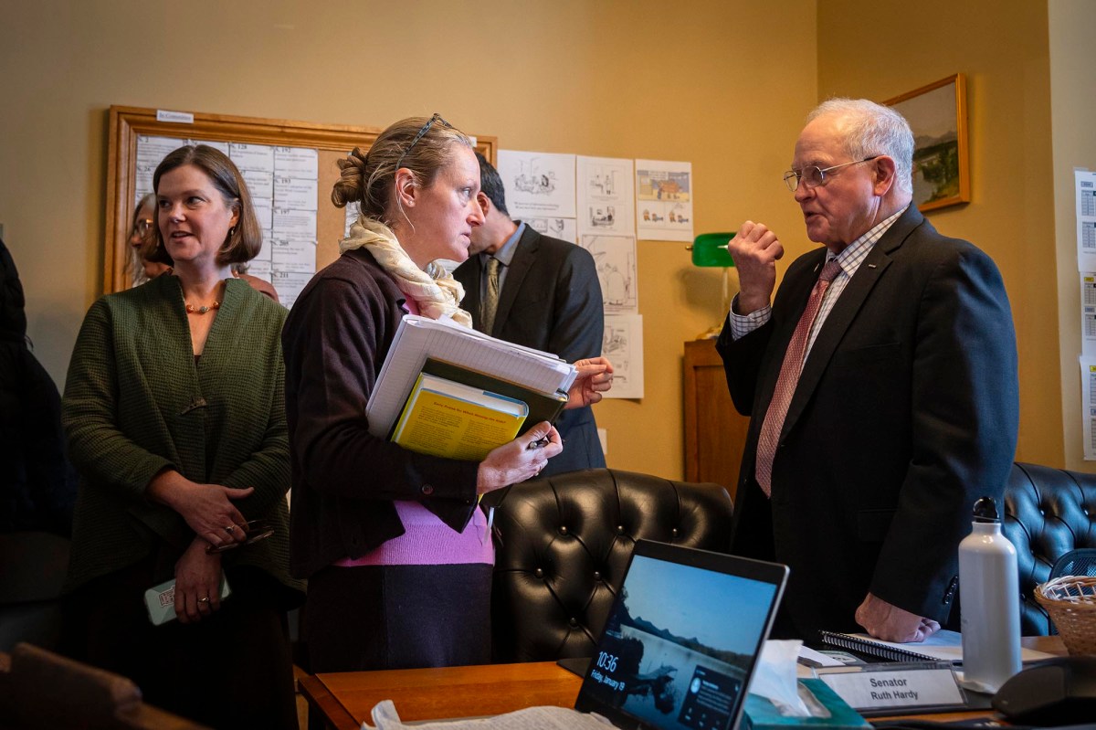 A group of people in an office.