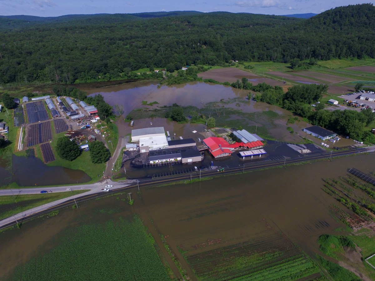an aerial view of a flooded farm.