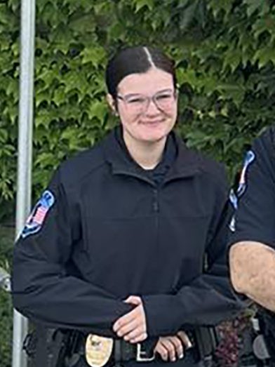 a police officer standing for a portrait