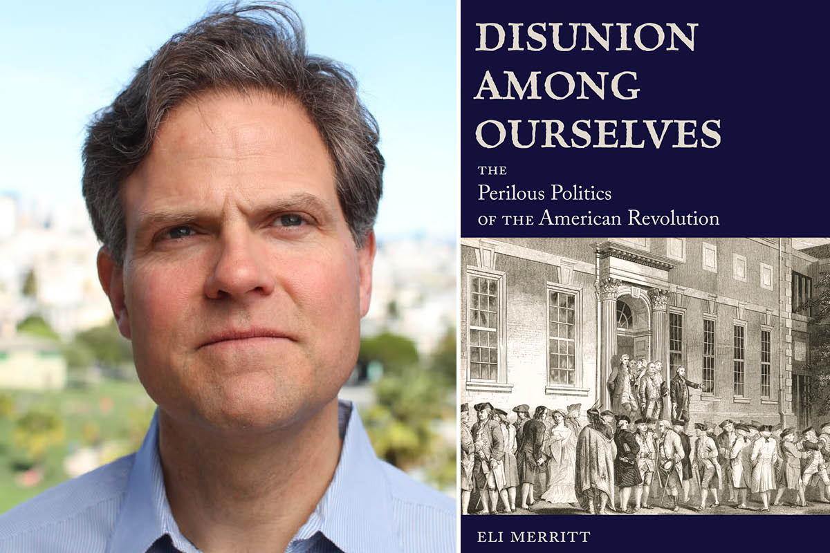 A man in a light blue shirt poses for a portrait next to an imahe of a navy-colored book with a historical image on the cover.