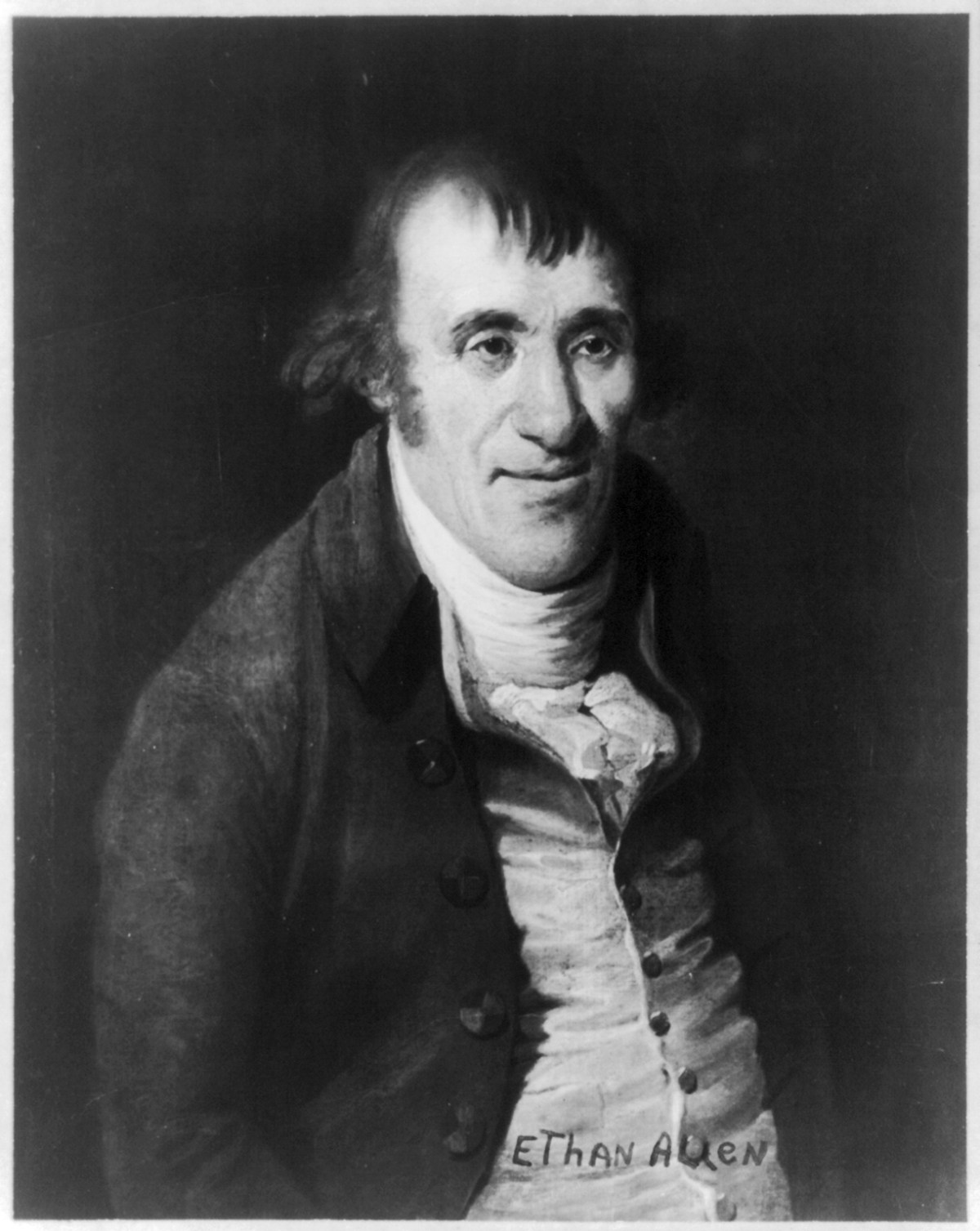 A black and white portrait of a man.