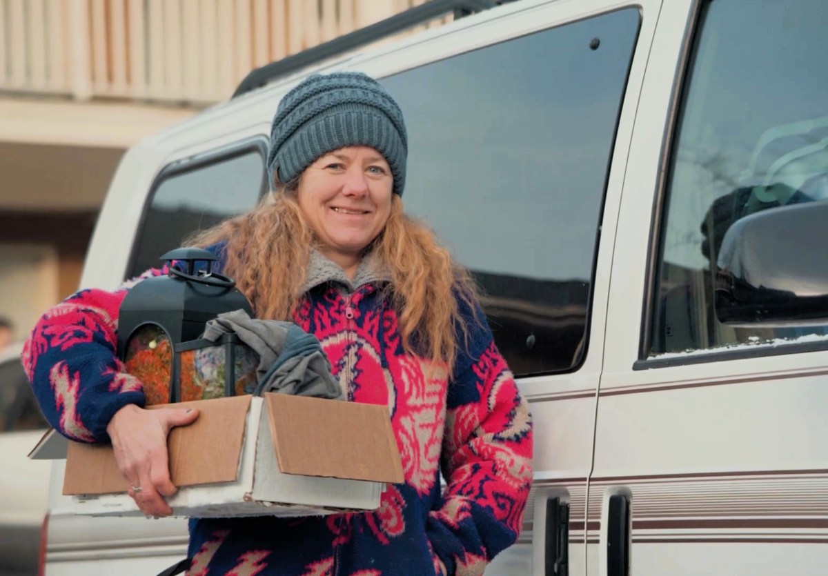 A person holding a box.