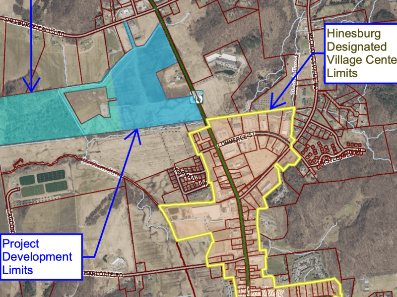 Aerial map showing property limits, Hinesburg Designated Village Center limits, and project development limits highlighted with yellow and blue boundaries.