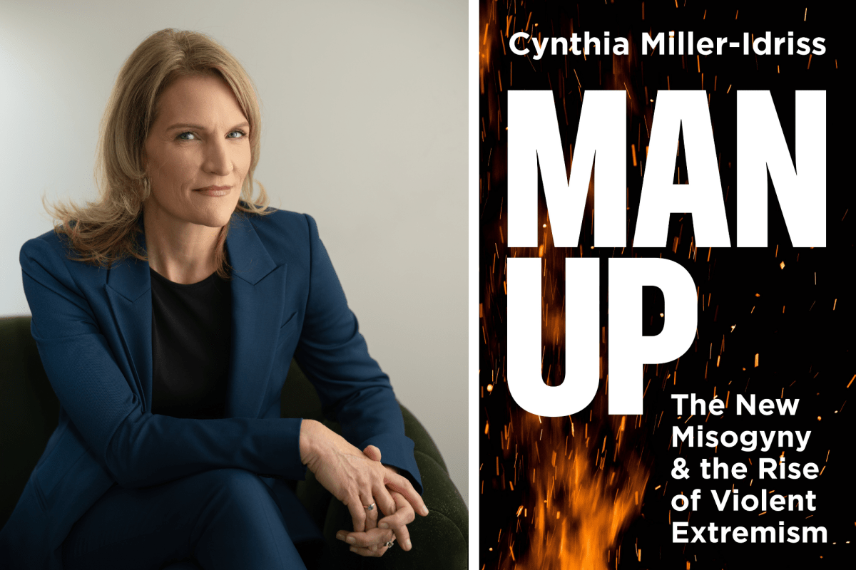 A woman in a blue suit sits on a chair; next to her is the cover of a book titled "MAN UP: The New Misogyny & the Rise of Violent Extremism" by Cynthia Miller-Idriss.