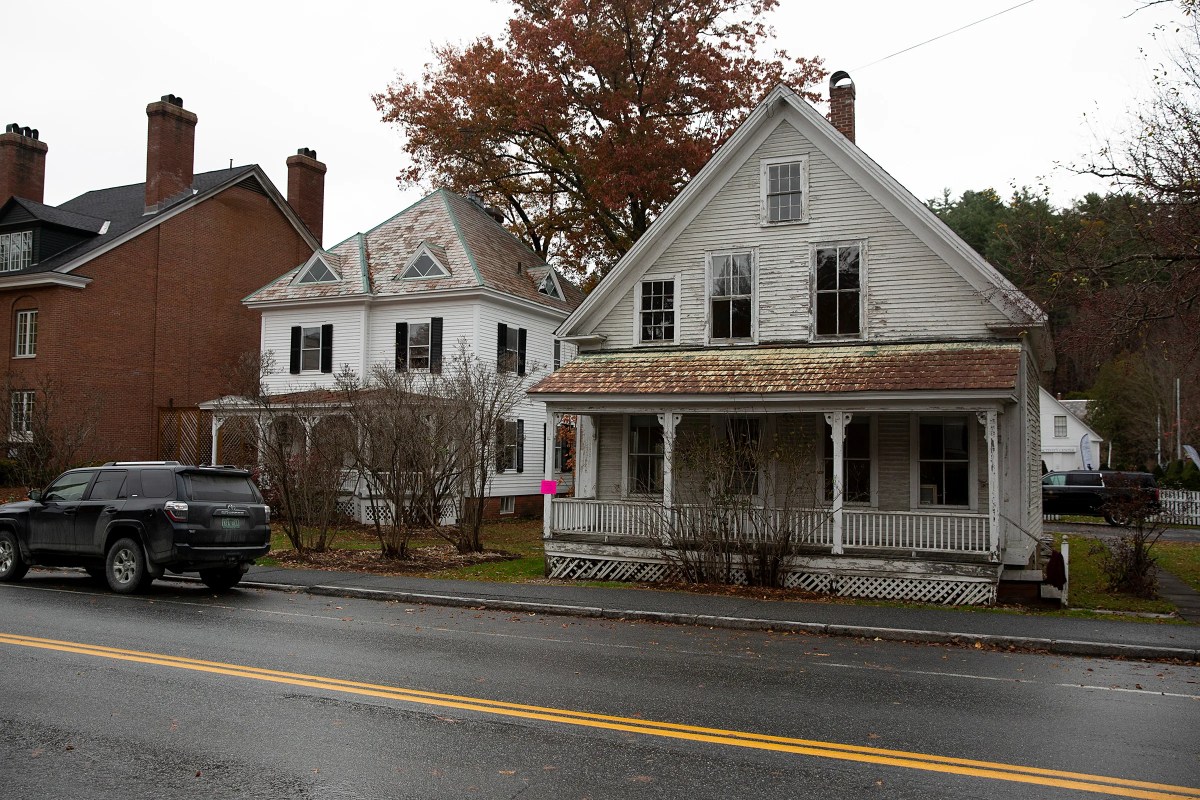 two homes painted white