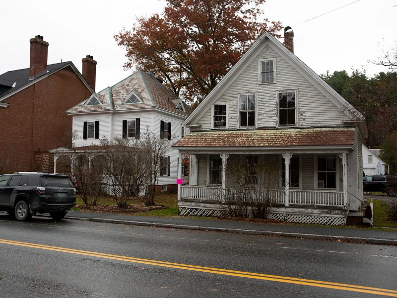 two homes painted white