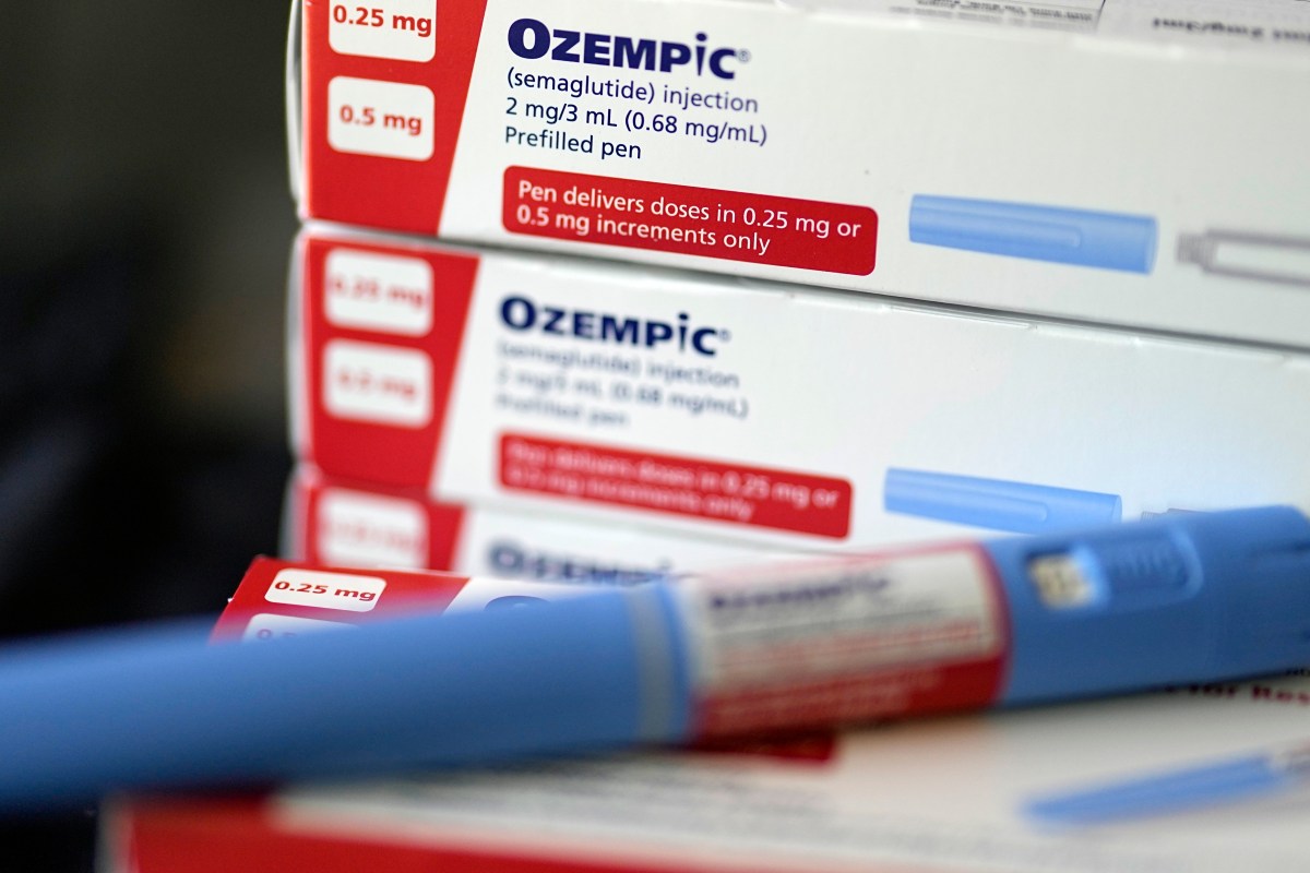 A close-up of Ozempic (semaglutide) injection boxes and a prefilled injection pen, showing dosage information and packaging details.
